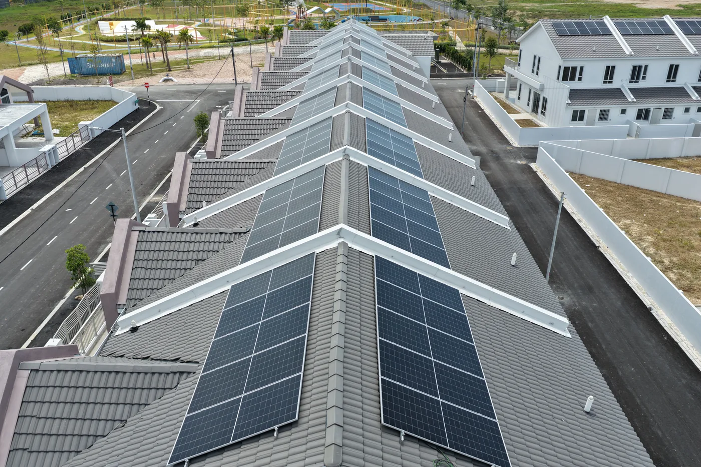 Rooftop solar PV array across Klemeru homes, Ipoh